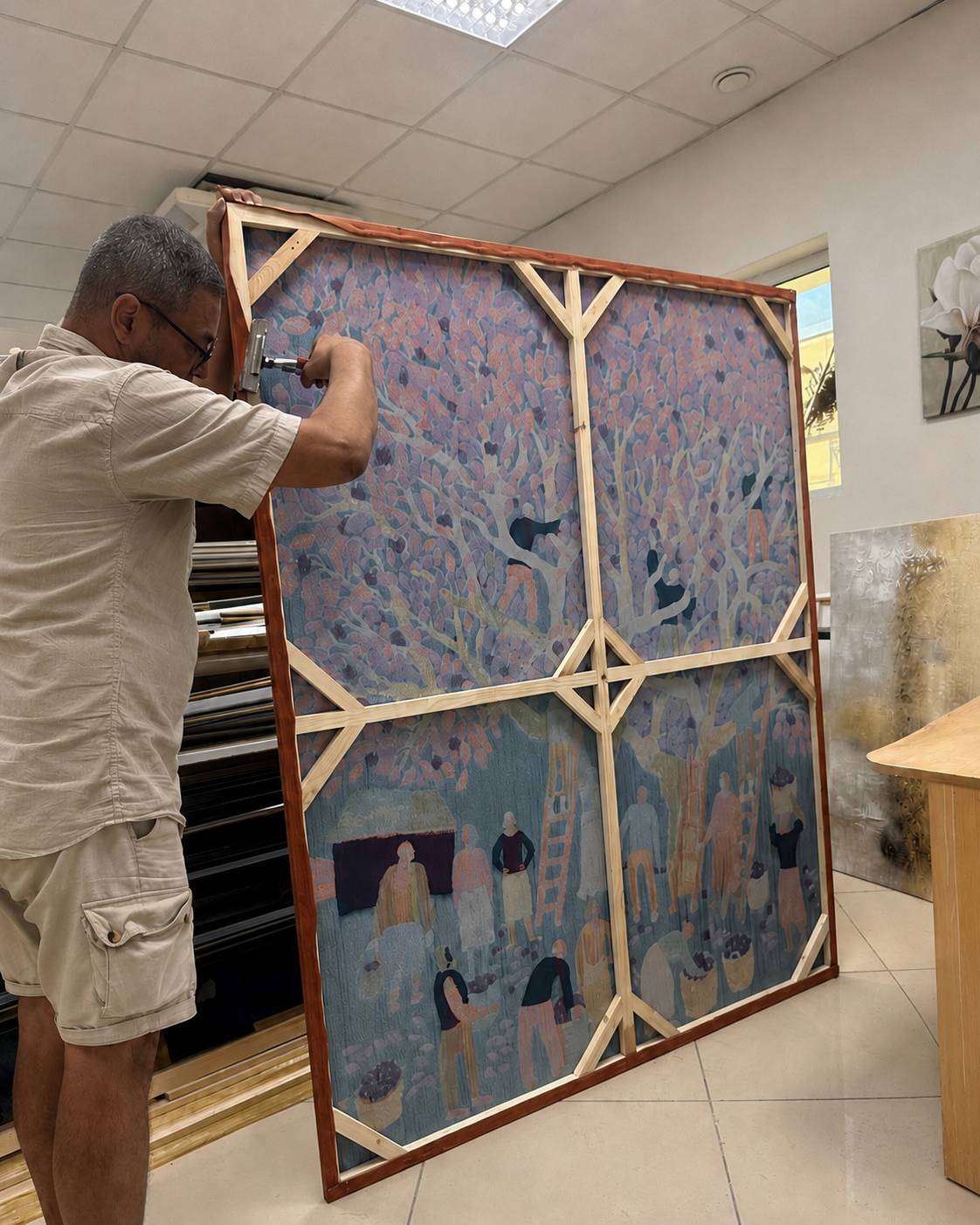 Large-format art production in the framing workshop